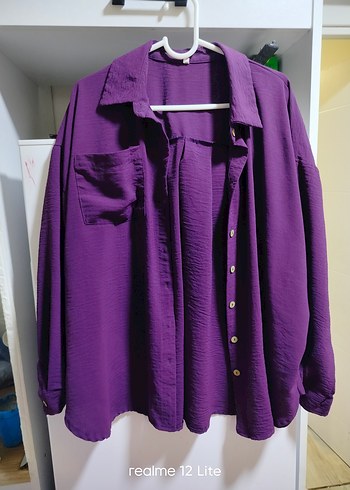 Mor Düğmeli Kadın Keten Gömlek
gögüs 70
boyu 70
arka boy 73 - Görsel 2