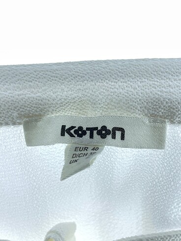 40 Beden beyaz Renk Koton Bluz %70 İndirimli.