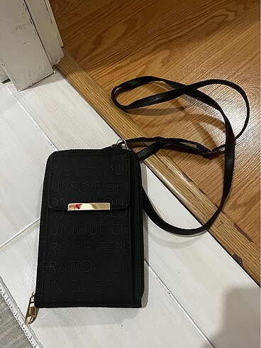 Tanesi 100 lira kullanılmamış kol cantasi