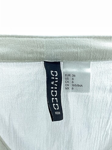 36 Beden beyaz Renk H&M Bluz %70 İndirimli.