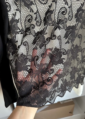 Mudo
Dantel İşlemeli Siyah Beyaz Kadın Bluz - Görsel 2