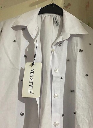 Markasız Ürün Beyaz gömlek etiketli