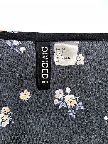 36 Beden siyah Renk H&M Kısa Elbise %70 İndirimli.