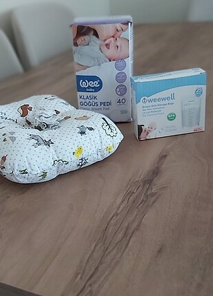 Emzirme yastigi emzirme onlugu sut torbasi ve gogus pedi
