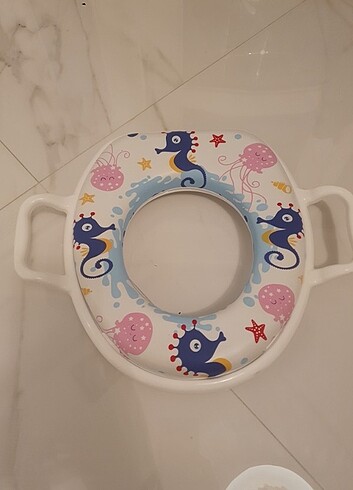 Ebebek marka klozet kapağı aparatı