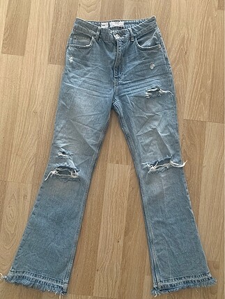 Açık mavi distressed İspanyol paça jean