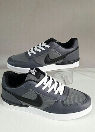 Nike spor ayakkabi 43 no 2 cift bir gri bir laci