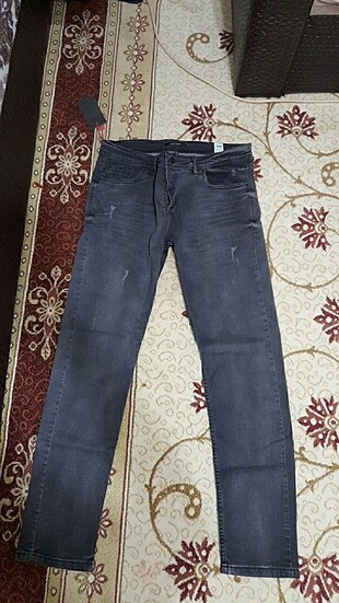 Erkek yetişkin kot pantolon