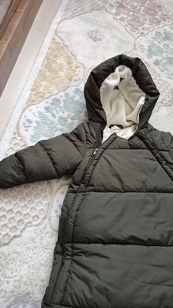H&M Kapüşonlu mont kundak