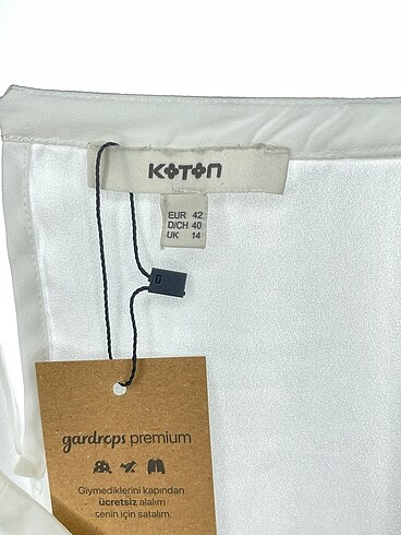 42 Beden beyaz Renk Koton Bluz %70 İndirimli.