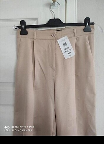 Krem rengi bol paça palazzo kumaş pantolon 