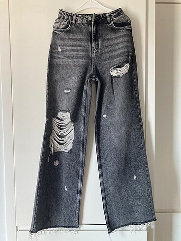 Yırtıklı eskitme jeans