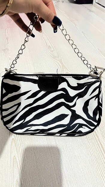zebra desenli kol/el çantası