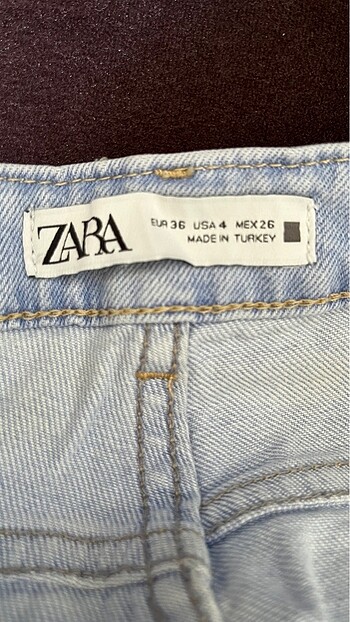 Zara Zara paçası yırtmaç jean