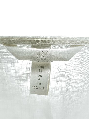 34 Beden beyaz Renk H&M Bluz %70 İndirimli.