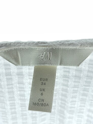 34 Beden beyaz Renk H&M Bluz %70 İndirimli.