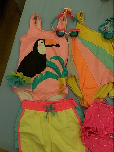 4 mayo 1 bikini 1 şort 12 gözlük