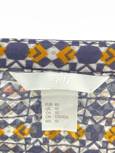 40 Beden çeşitli Renk H&M Gömlek %70 İndirimli.