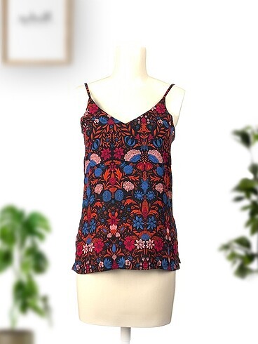 H&M Bluz %70 İndirimli.