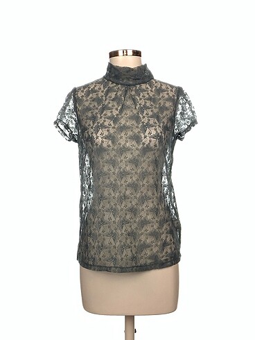 Zara Bluz %70 İndirimli.