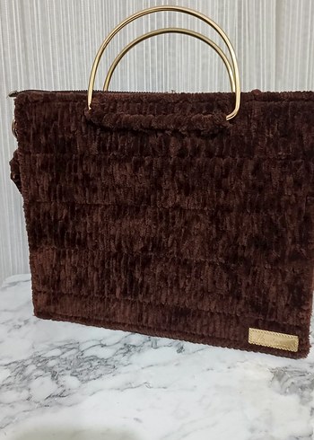 Zara Sikligin Ve Rahatligin Bulustugu Kahverengi El Cantasi