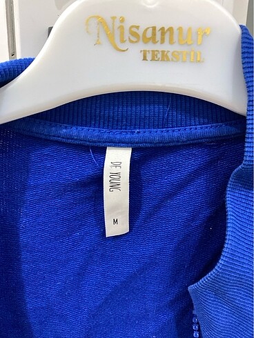 Defacto spor üst