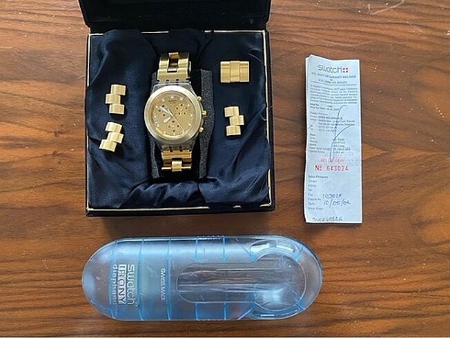 Swatch Guess gold saat unisex model ikiside