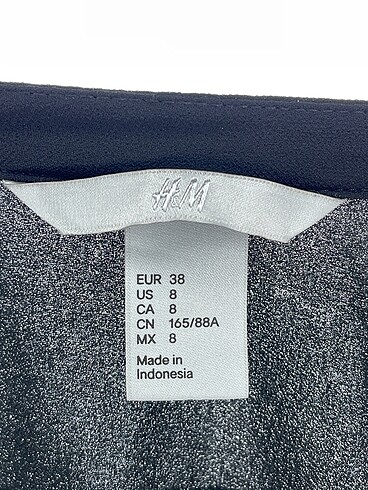38 Beden siyah Renk H&M Gömlek %70 İndirimli.