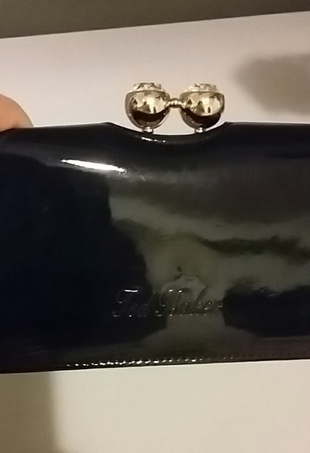 xl Beden siyah cüzdan 1 defa kullandım yenidir