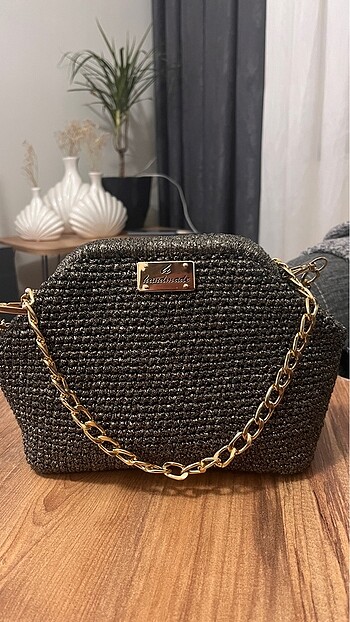 İpekyol model zincirli burs çanta