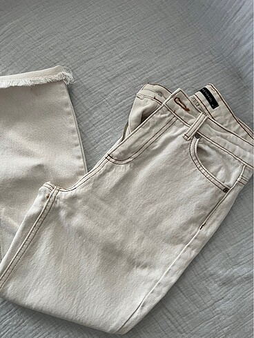 Krem kot pantolon