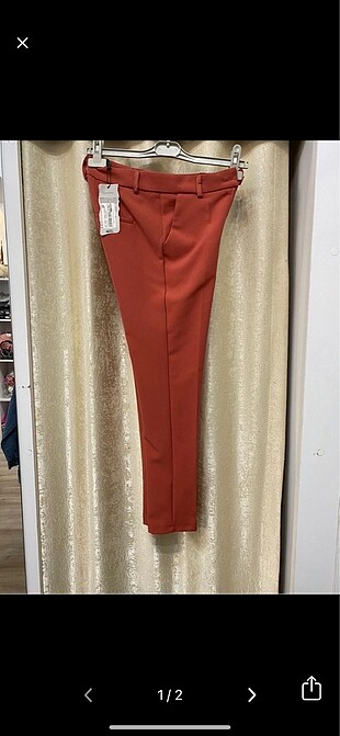Dar paça kumaş pantolonlar indirimde
