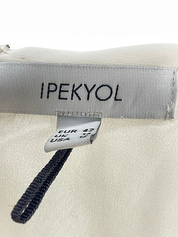 42 Beden beyaz Renk ipekyol Bluz %70 İndirimli.