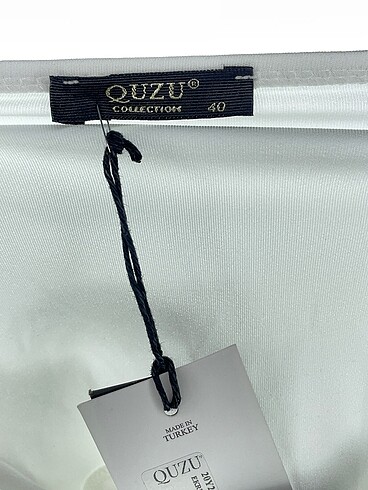 40 Beden beyaz Renk Quzu Mini Üst %70 İndirimli.