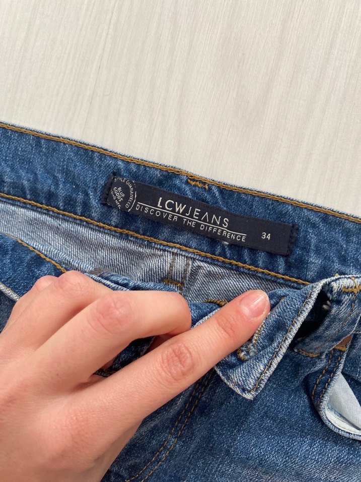 Kadın Mavi Yırtık Mini Kot Şort - Görsel 3