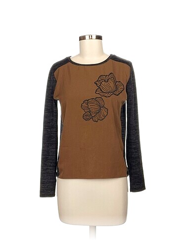 Zara Bluz %70 İndirimli.