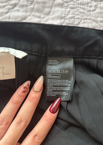 36 Beden siyah Renk H&M Siyah Pilili Etek