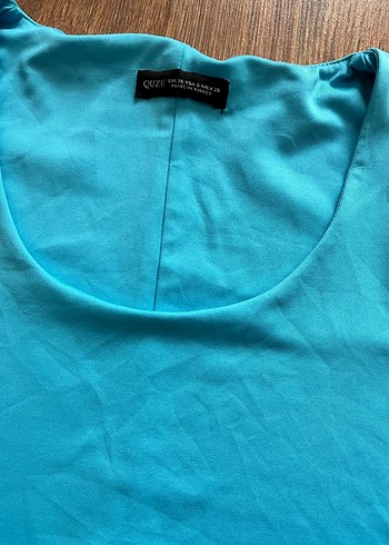 Turkuaz Düz Sporcu Kadın Atlet - Görsel 3