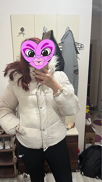 Bej rengi şişme mont