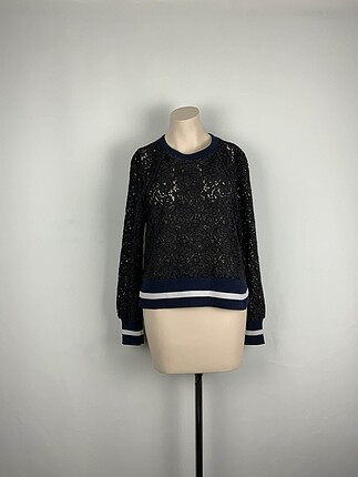 Zara Bluz %70 İndirimli.