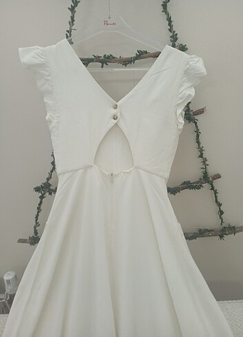 Zara Zara sırt detaylı pamuk keten elbise kırık beyaz açık krem tonla