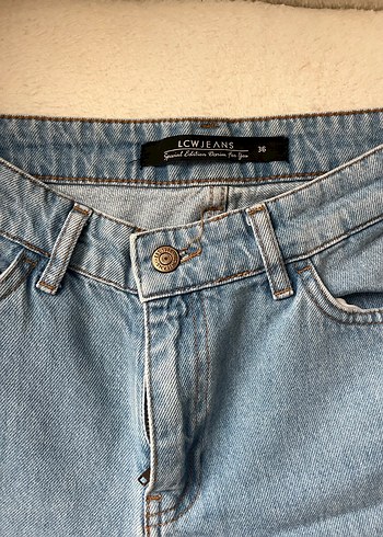 Püsküllü boru paça jean - Görsel 6