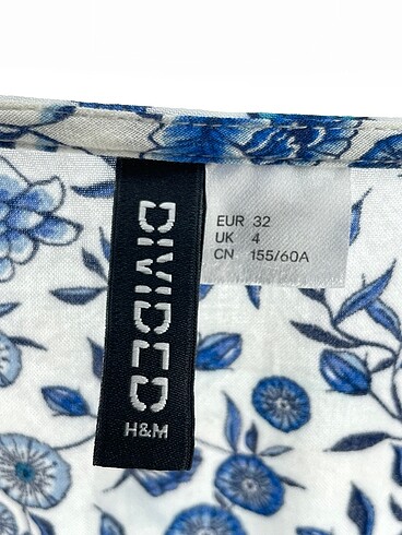 32 Beden mavi Renk H&M Kısa Tulum %70 İndirimli.
