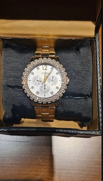 Orjinal gues saat swarovski taşlı harika ışıl ışıl pilli çalışıy