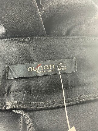 40 Beden Diğer Kumaş Pantolon %70 İndirimli.