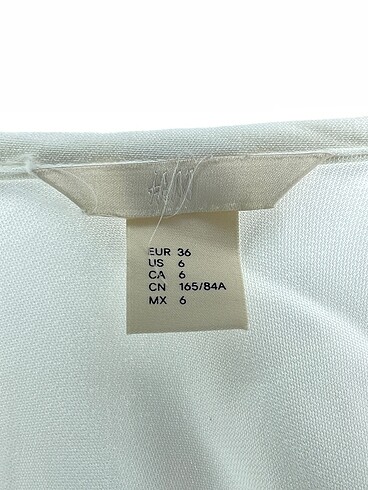 36 Beden beyaz Renk H&M Bluz %70 İndirimli.