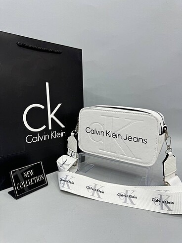 Calvin Klein Calvin 21*13 cm içi astarsız arkada cep var