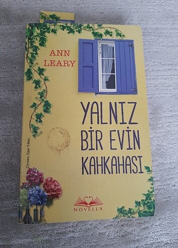  YALNIZ BIR EVİN KAHKAHASI ROMAN