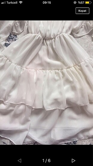 Beyaz fırfırlı elbise