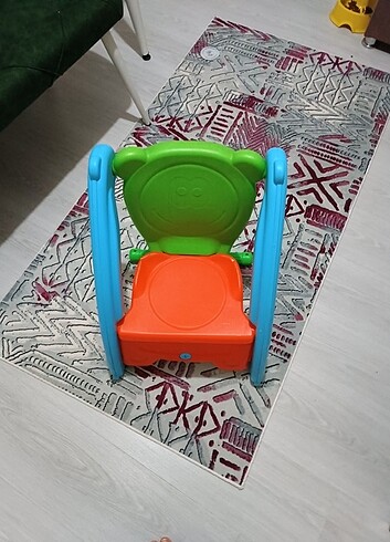 Hem sandalye hem sallanan oyuncak